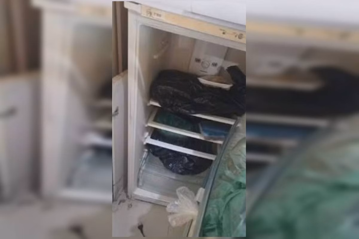 Geladeira onde partes do corpo da vítima foram escondidas no Morro de São Carlos, no Rio de Janeiro